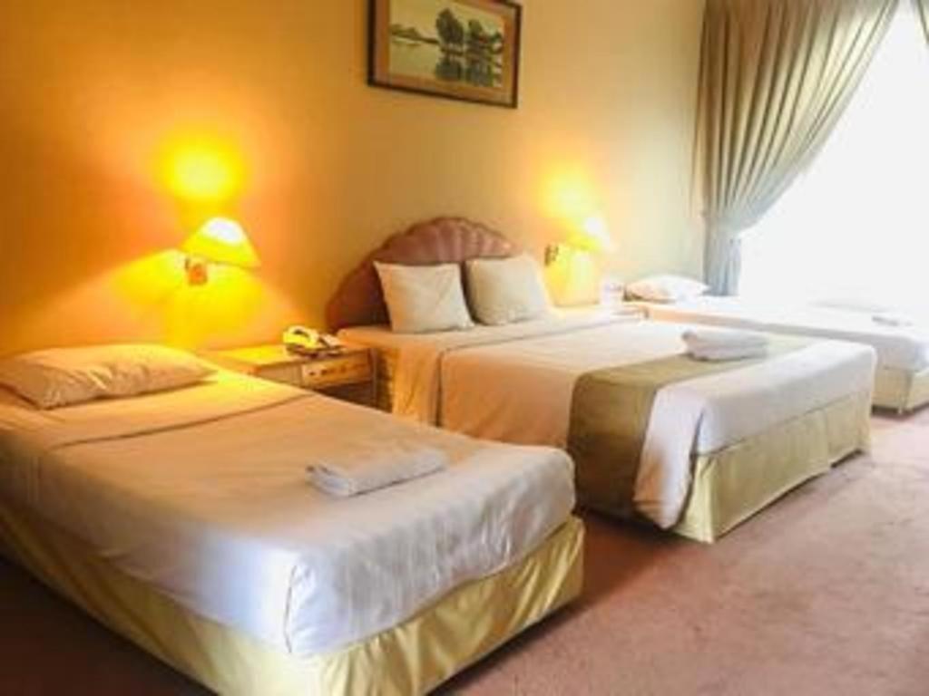 New Grand Park Hotel Surabaya Buitenkant foto